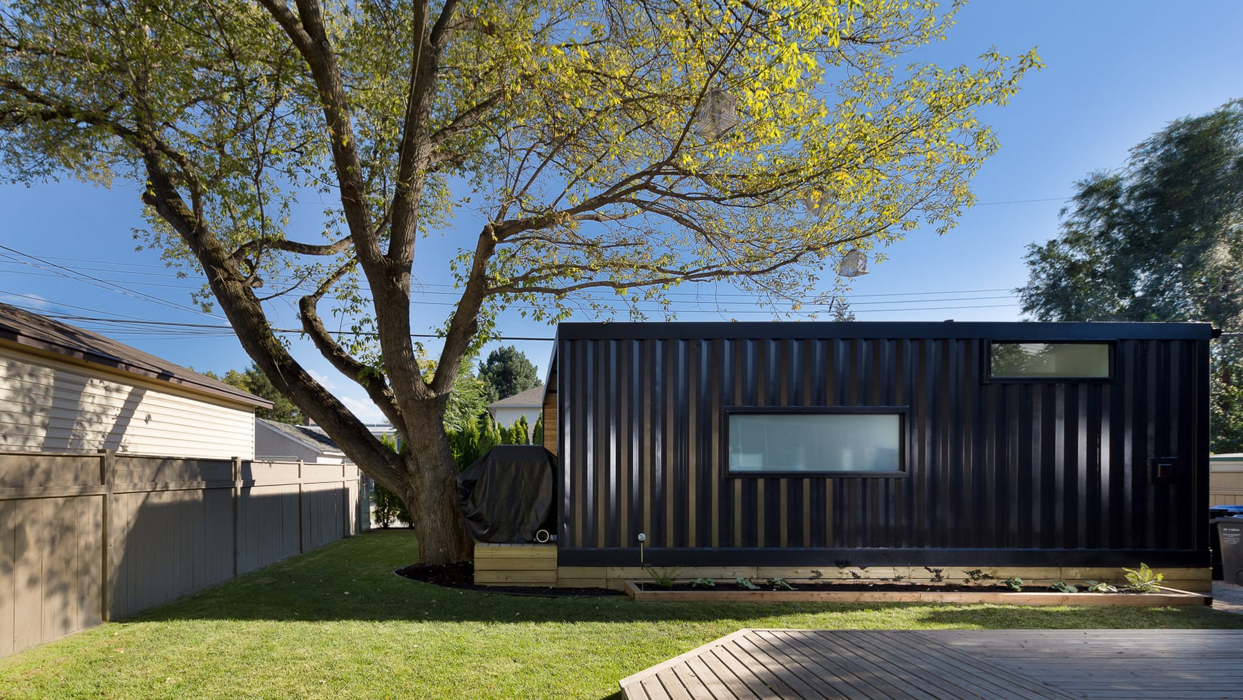 HonoMobo Create Shipping Container Homes Above Garages